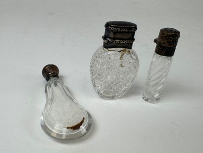Three crystal and cut-glass salt flasks,...