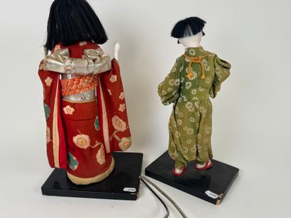 ASIA, 20th century.
Two figures in traditional...