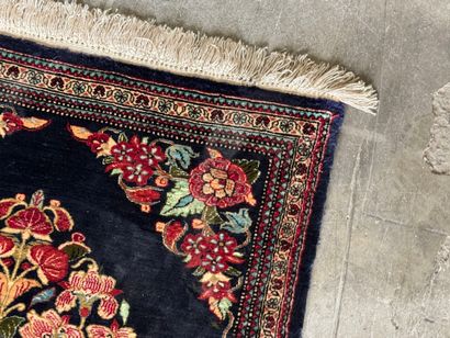 GHOUM.
Handmade silk carpet decorated with...