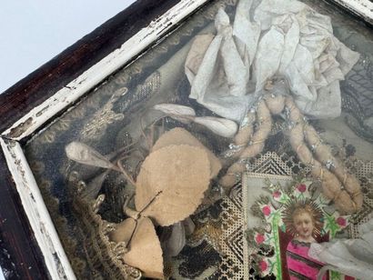 Reliquary diamond-shaped wooden frame, the...