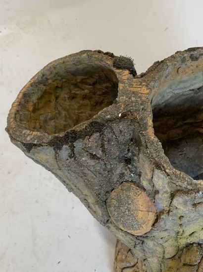 Reconstituted stone planter forming a tree...