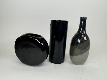 Set of two ceramic vases and a bottle with...