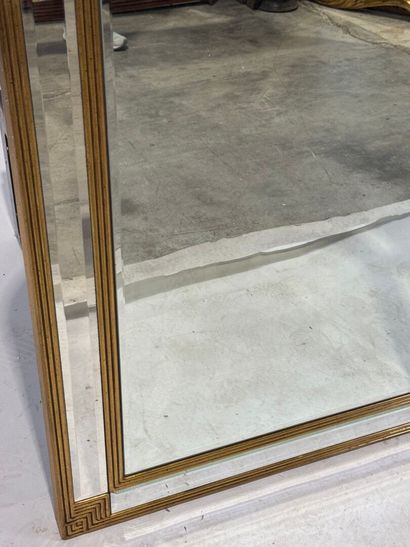 Gilded wood mirror with rounded top and beveled...