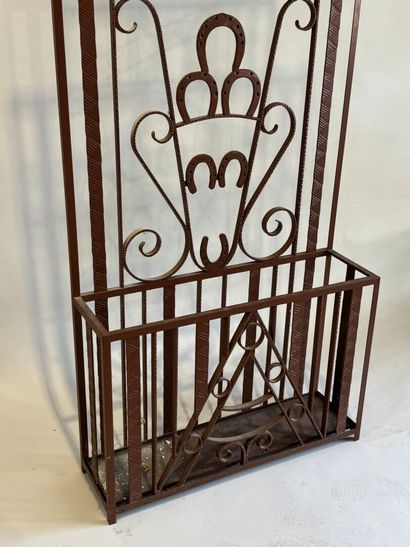 Wrought and painted iron checkroom decorated...