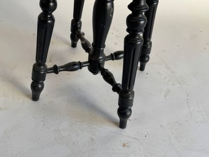 Molded, carved and blackened wood piano stool.
Napoleon...