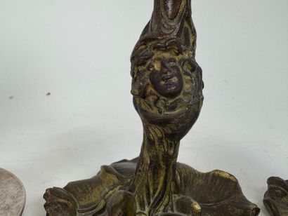 Lot including :
- a pair of patinated bronze...