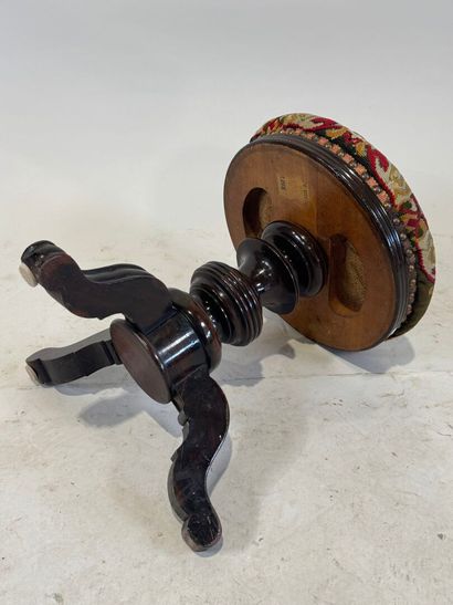 Circular tripod piano stool in molded and...