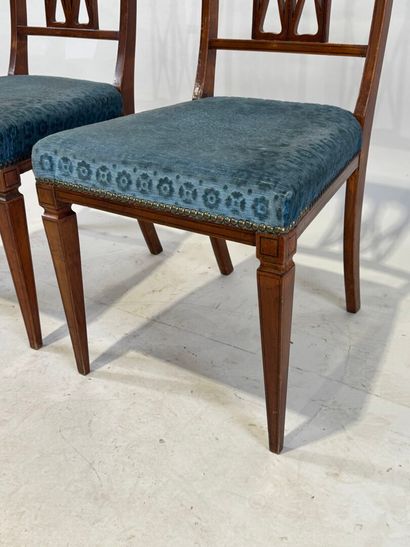 Pair of molded wood chairs with openwork...