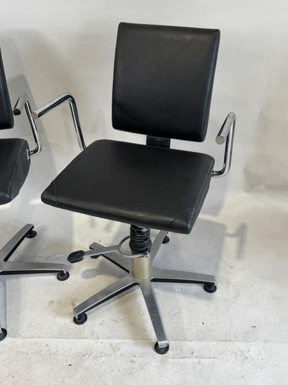 Pair of chromed metal and leather barber...