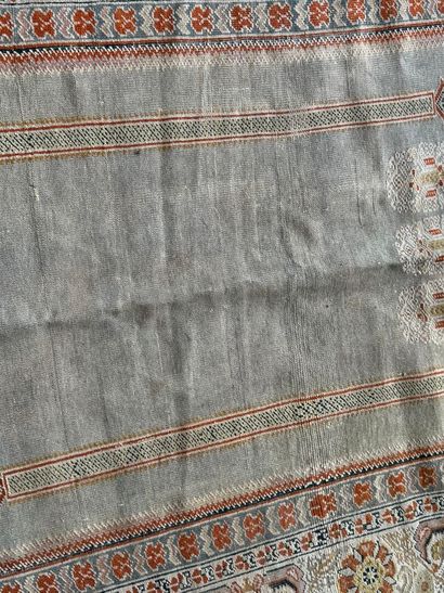 Wool and silk rug with stylized motifs. 
164...