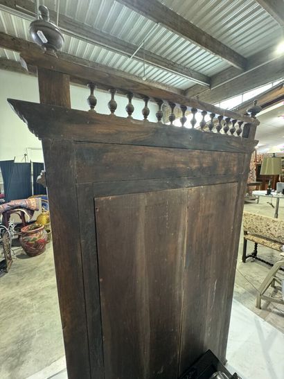Large mirror in stained wood, the uprights...