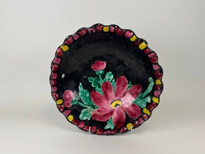 VALLAURIS.
Large ceramic bowl on black ground...