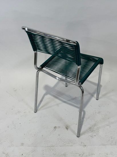 Chair with chromed metal tubular frame, back...