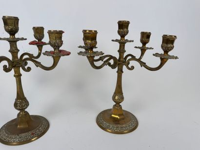 Two pairs of brass torches or candlesticks,...