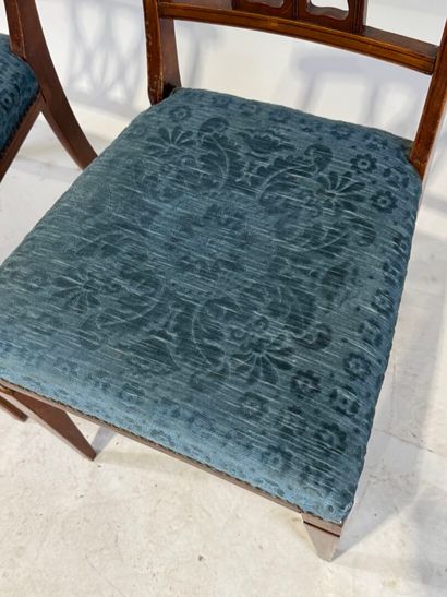 Pair of molded wood chairs with openwork...