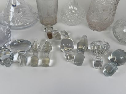 Seven glass and crystal decanters.
H. 30...
