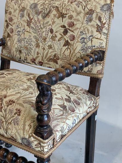 Armchair in stained natural wood, the armrests,...