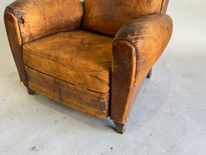 Club armchair in havana leather with arched...