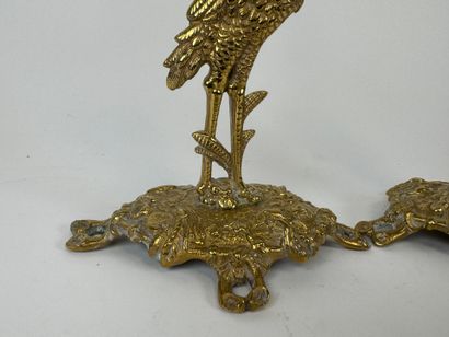 Pair of chased brass torches decorated with...
