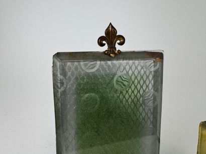 Two beveled glass and openwork brass photo...