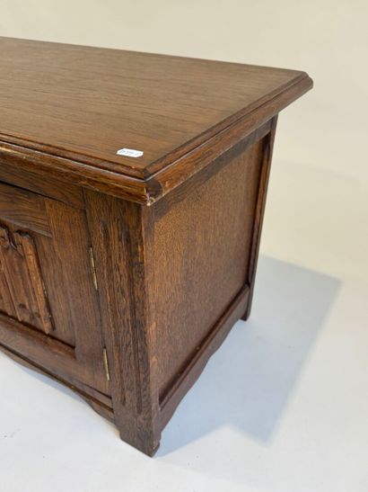Moulded and carved oak chest opening with...