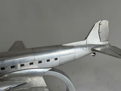 20th century school. 
Douglas DC-3 aircraft....