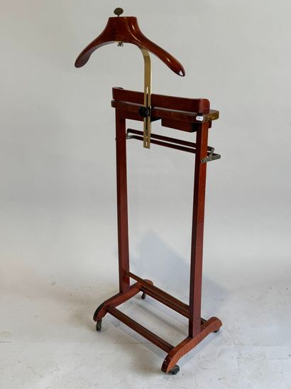 Valet in stained wood and brass. On castors....