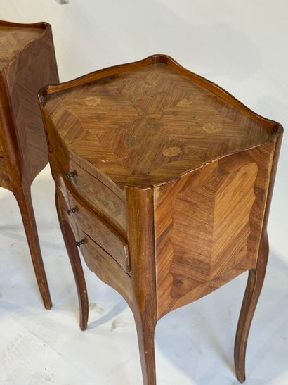 A pair of Louis XV style, molded rosewood...
