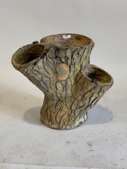 Reconstituted stone planter forming a tree...