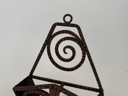 Small wrought-iron wall unit with scroll...