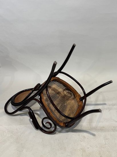KOHN Stained bentwood armchair, cane seat....