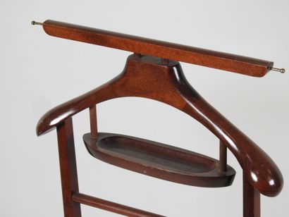 Wooden nightstand on four casters.
Work from...