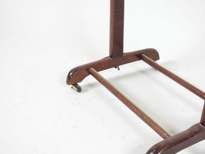 Wooden nightstand on four casters.
Work from...