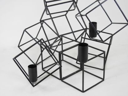 Black lacquered metal candelabra in the form...