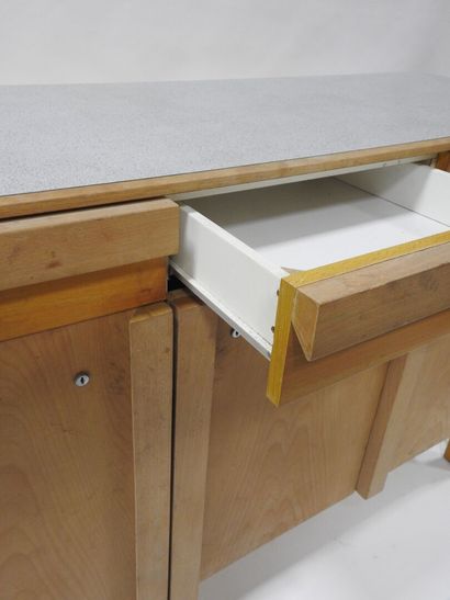 Wood and plywood sideboard opening with three...