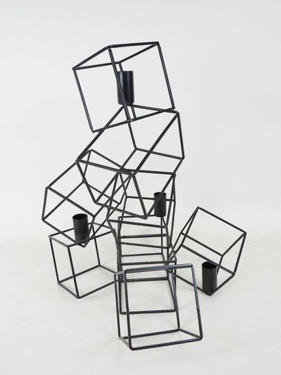 Black lacquered metal candelabra in the form...
