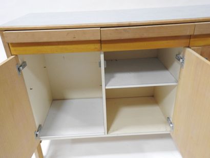 Wood and plywood sideboard opening with three...