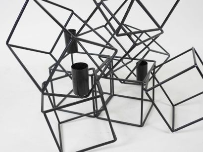 Black lacquered metal candelabra in the form...