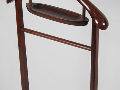 Wooden nightstand on four casters.
Work from...