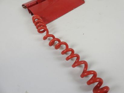 Red lacquered metal desk lamp.
Work from...