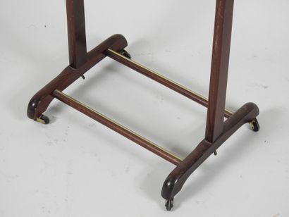 Wooden nightstand on four casters.
Work from...
