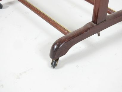 Wooden nightstand on four casters.
Work from...