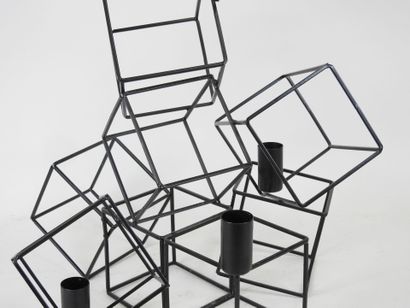 Black lacquered metal candelabra in the form...