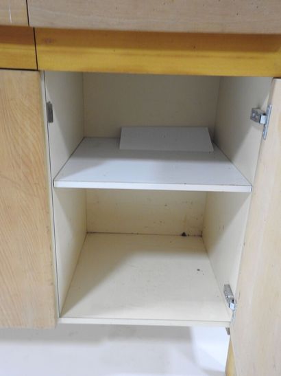 Wood and plywood sideboard opening with three...