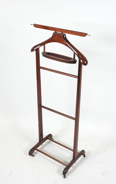 Wooden nightstand on four casters.
Work from...