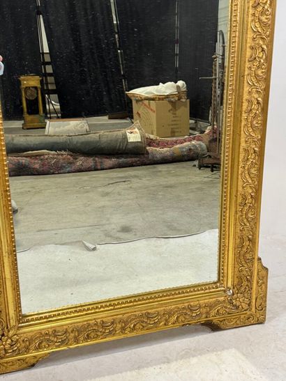 Rectangular wood and stucco mirror with rows...