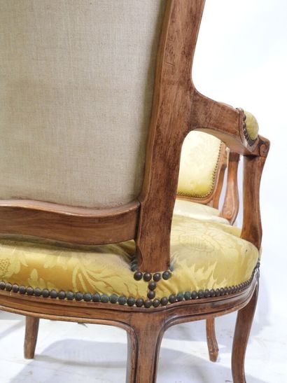Suite of four molded and carved wood armchairs,...