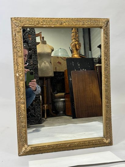 Rectangular wood and gilded stucco mirror...