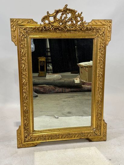Rectangular wood and stucco mirror with rows...