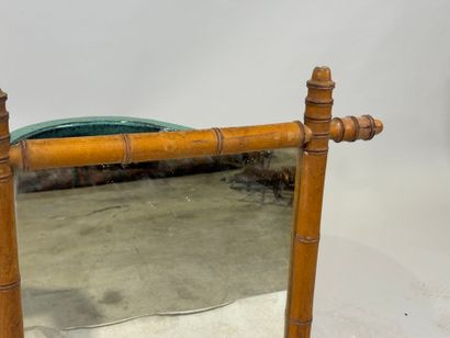 Rectangular bamboo-framed mirror. 
69 x 56...
